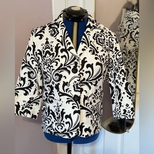 Gothic vintage scroll design is back in style and this jacket delivers!